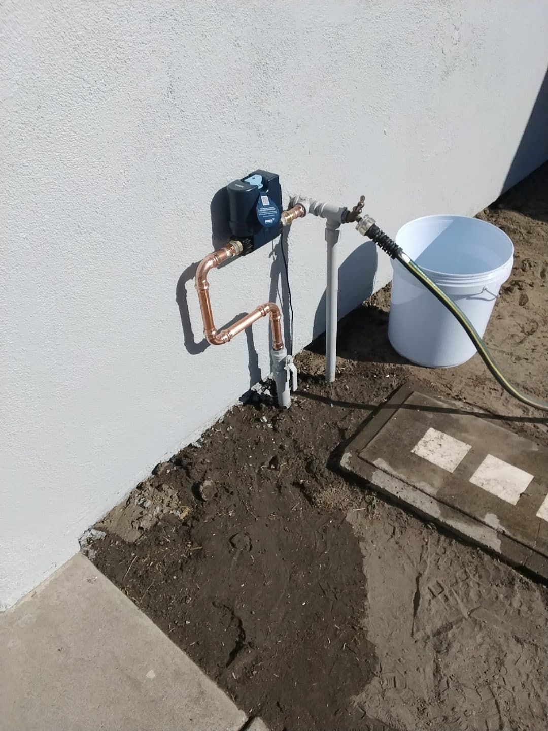 Automatic water shutoff valve installation on copper piping in Fullerton